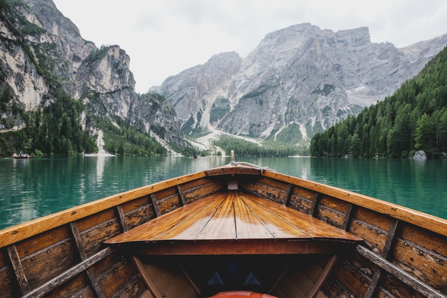A family exploring beside a mountain lake