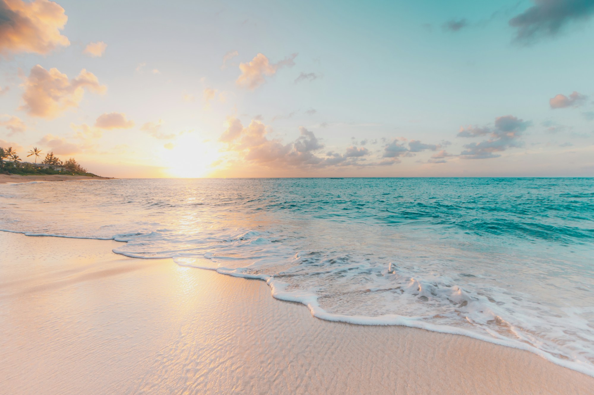 A tropical beach at sunrise